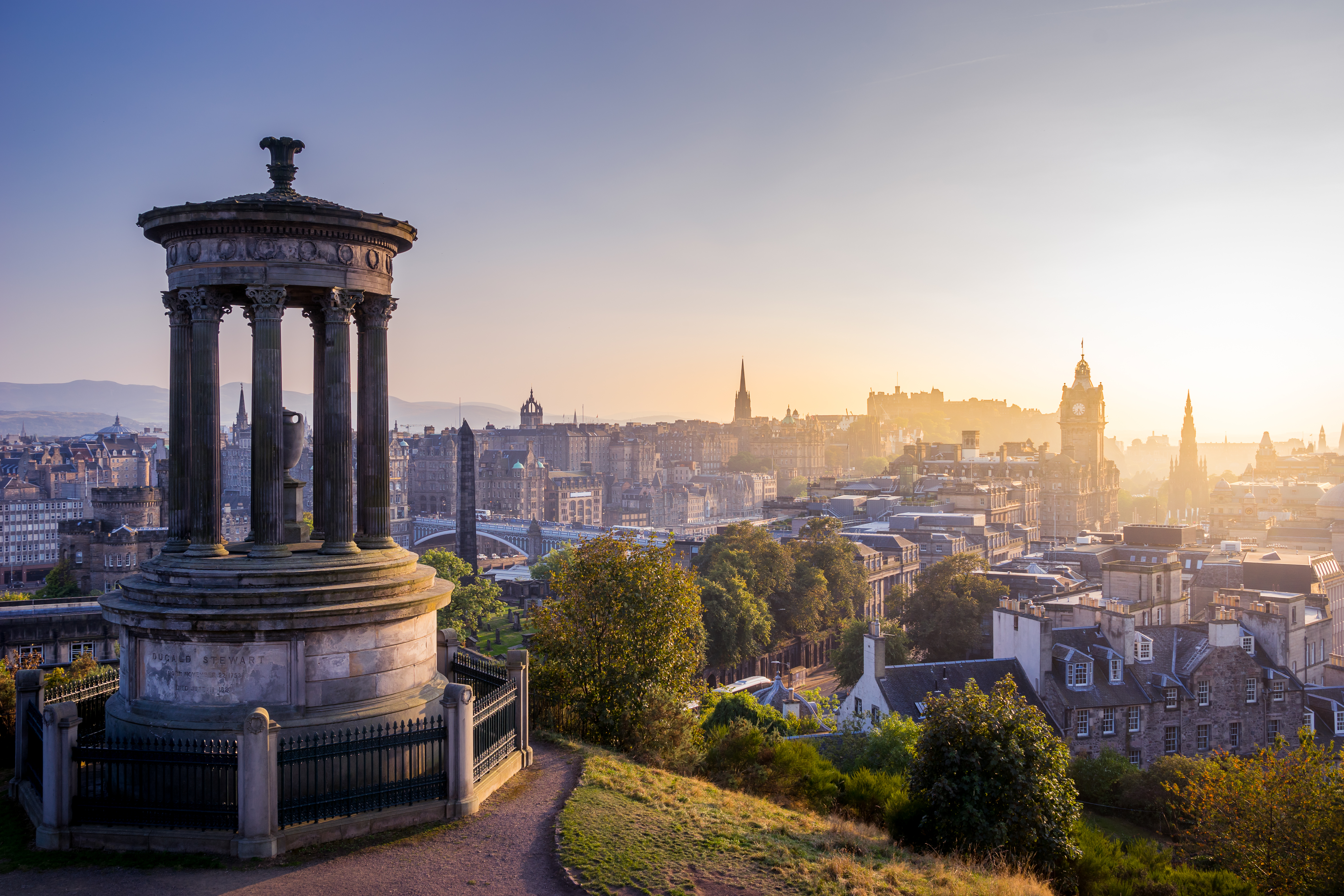 Edinburgh skyline from Calton Hill at sunset.