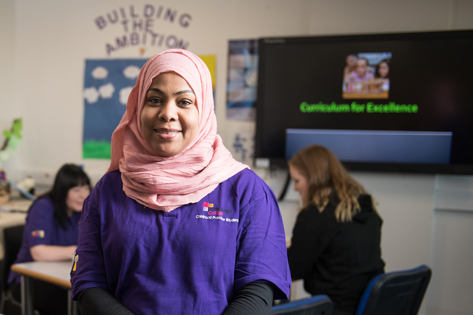 Childhood practice student in their classroom.